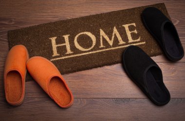 Brown carpet doormat with text Home clipart