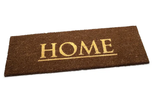 Καφέ χαλί doormat με κείμενο σπίτι — Φωτογραφία Αρχείου