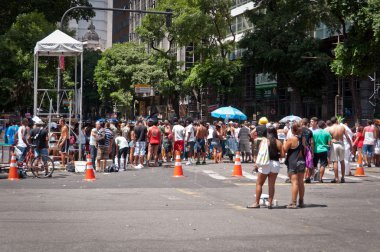 Revellers in costumes take over the streets of the city center in Rio's largest carnival