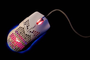 White Gaming Mouse With Led Lights on Black Background clipart