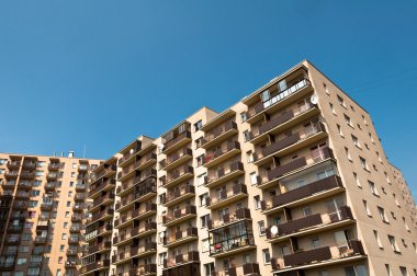 Appartment Buildings with blue bright sky