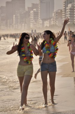 Women enjoy Carnival in Ipanema beach