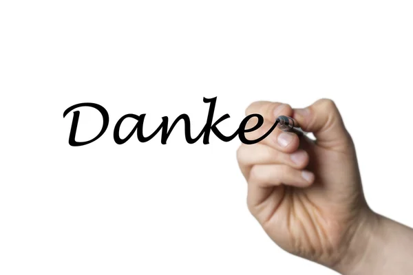 Danke geschreven door een hand — Stockfoto