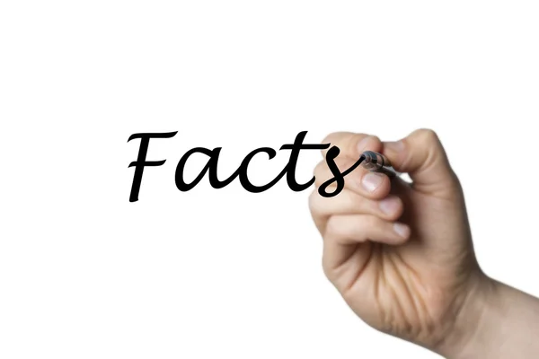 Facts written by a hand — Stock Photo, Image