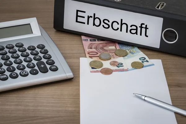 Erbschaft geschreven op een binder — Stockfoto