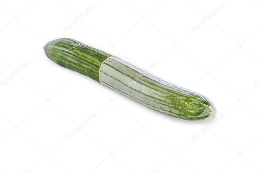 cucumber with condom on white