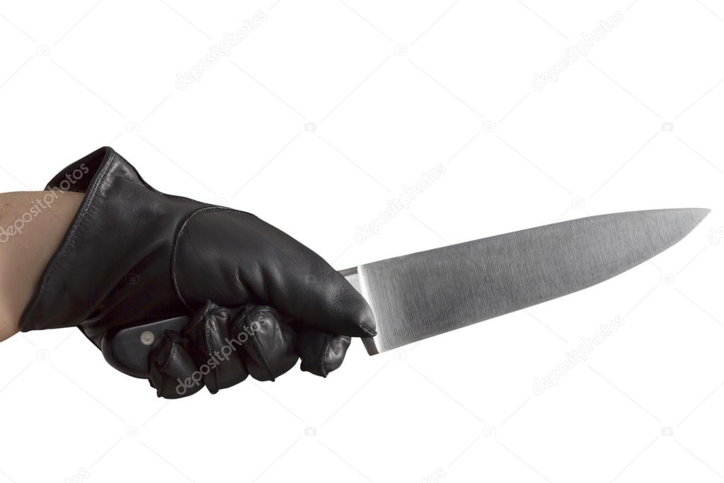 Hand in leather gloves holding knife — Stock Photo © kunertus #57557275