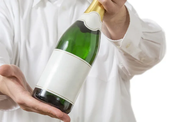 Waiter presenting a botle of Champagne — Stock Photo, Image