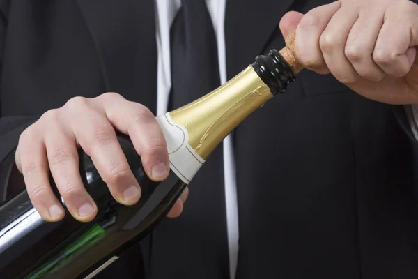 Şampanya şişe açılış siut adam