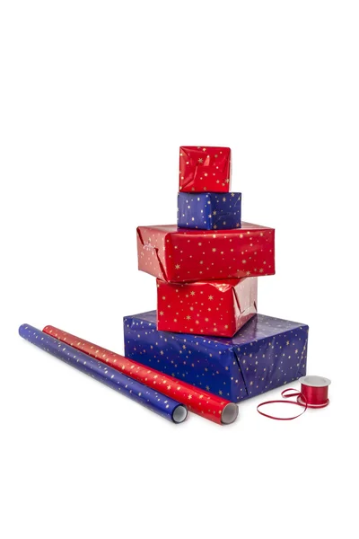 Stack of five Presents and wrapping Paper — Stock Photo, Image