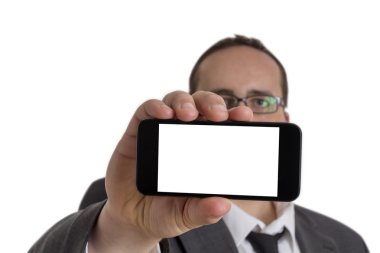 Cep telefonu ile takım elbiseli genç işadamı