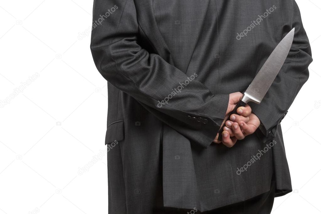 Man in suit with large knife
