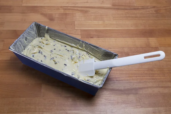 Dough in cake tin — Stock Photo, Image