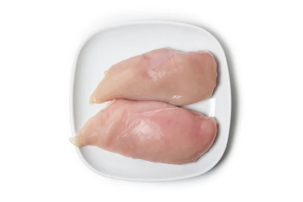 Filete de pechuga de pollo en blanco —  Fotos de Stock