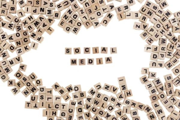 Social media written in small wooden cubes — Stock Photo, Image