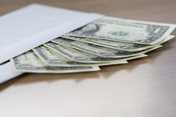 Dollar Notes in an envelope — Stock Photo, Image