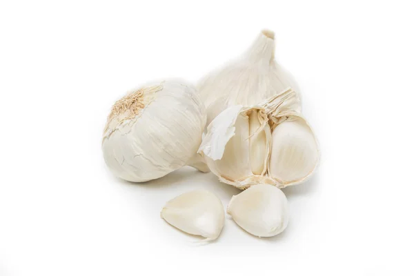 Garlic bulb and single cloves on white — Stock Photo, Image