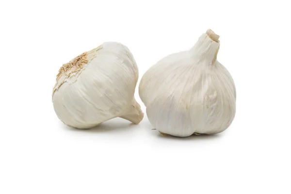 Garlic bulbs on white — Stock Photo, Image