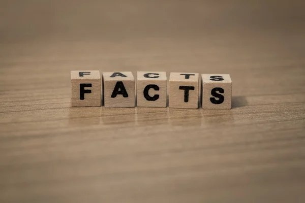 Facts in wooden cubes — Stock Photo, Image
