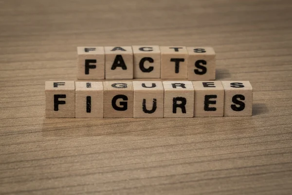 Facts figures in wooden cubes — Stock Photo, Image
