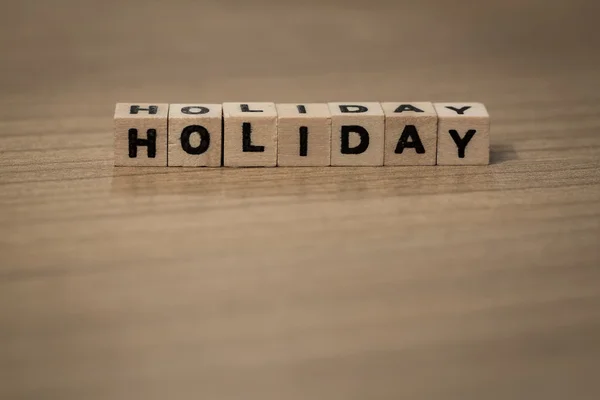 Holiday in wooden cubes — Stock Photo, Image