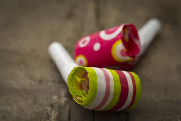 Party Blower on wood — Stock Photo, Image