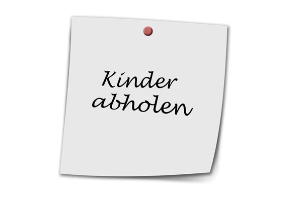 Kinder abholen écrit sur un mémo — Photo