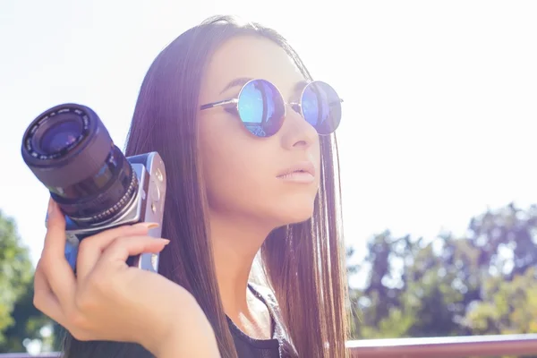 Woman photographer with glasses — Stock Photo, Image