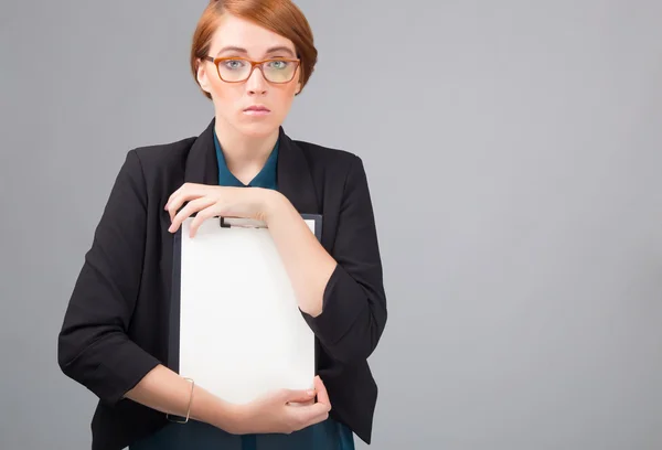 Businesswoman with white sheet of paper — Stock Photo, Image