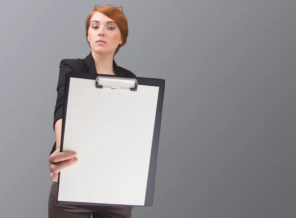 Businesswoman with white sheet of paper — Stock Photo, Image