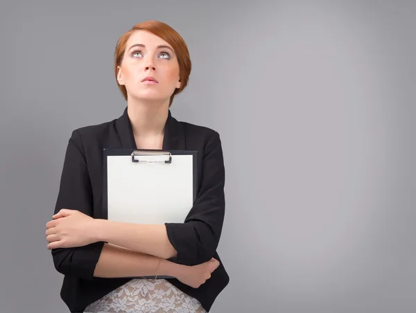 Businesswoman with white sheet of paper — Stock Photo, Image