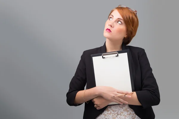 Businesswoman with white sheet of paper — Stock Photo, Image