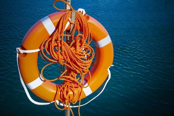 Life buoy in water — Stock Photo, Image