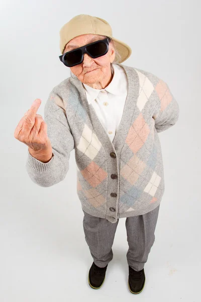 Cool grandma showing her f-finger — Stock Photo, Image