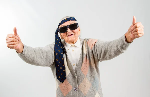 Bohemian grandma with a tie on her forehead — Stock Photo, Image