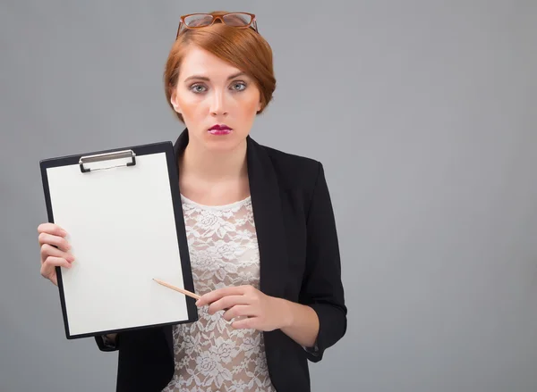 Businesswoman with white sheet of paper — Stock Photo, Image