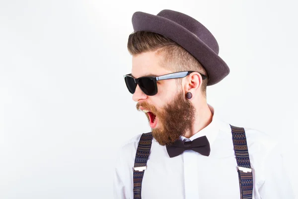 Hipster with hat  making funny faces — Stock Photo, Image