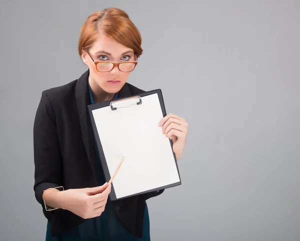 Businesswoman with white sheet of paper — Stock Photo, Image