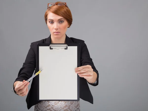 Businesswoman with white sheet of paper — Stock Photo, Image