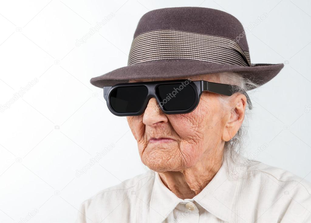 Old lady in elegant hat Stock Photo by giorgiomtb 54499219