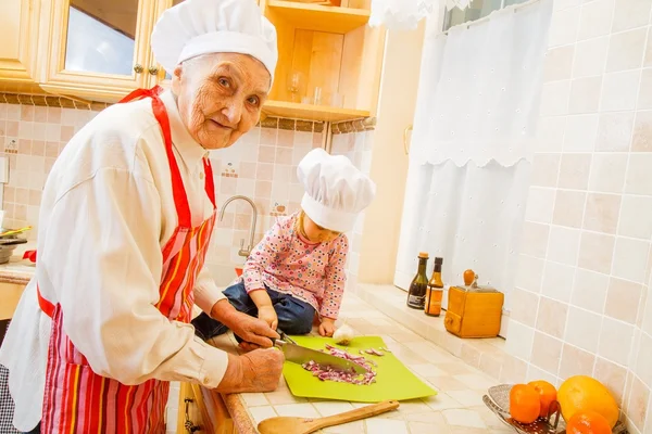 Preparing food with grand-child — Φωτογραφία Αρχείου
