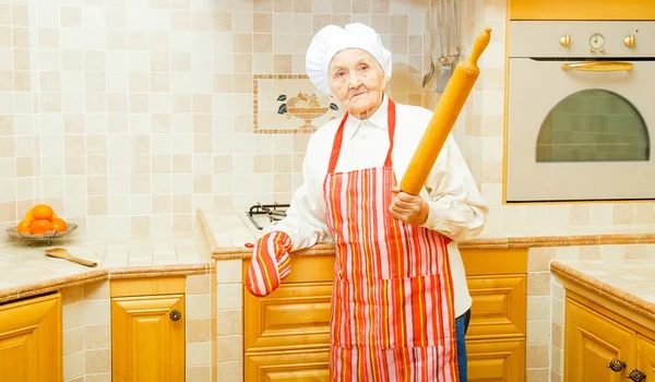 Lady with rolling pin — Stock Photo, Image