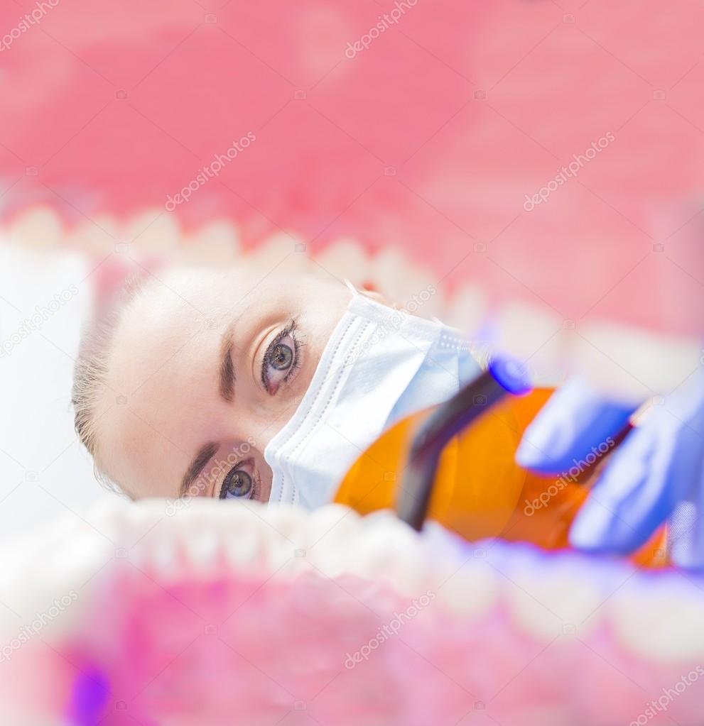 Dentist working POV