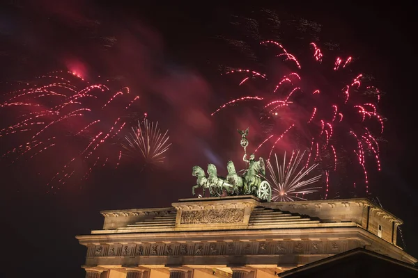 Fireworks over the Brandenburg Gate in Berlin, Germany,  during New Year concert and celebrations.