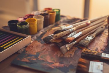   photo of palette with mixed oil paints 