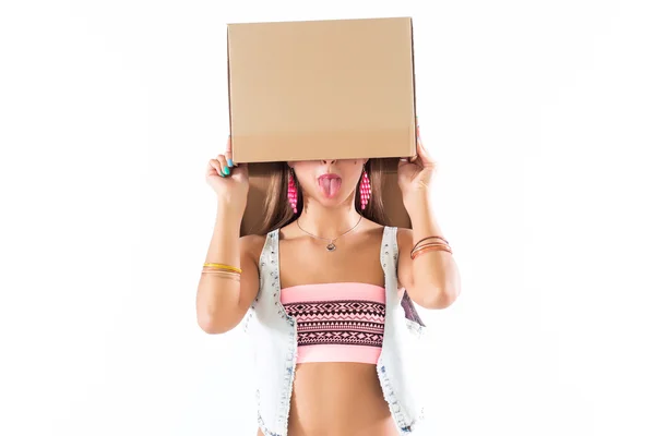 Fit blonde woman holding cardboard box — Stock Photo, Image