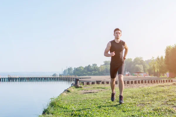 Fit man running outdoor — Stock Photo, Image