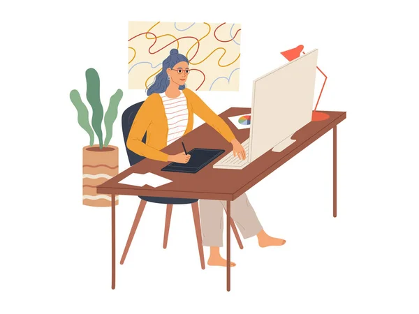 La donna lavora al suo computer usando un tablet grafico. Un dipendente della professione creativa. — Vettoriale Stock