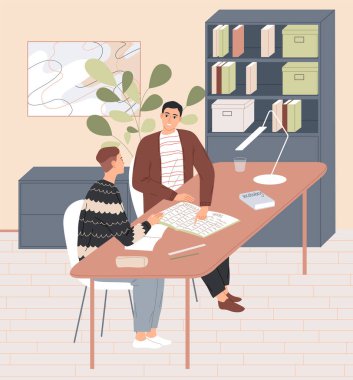 Öğretmen ve öğrenci masada oturuyorlar. Bireysel ders.