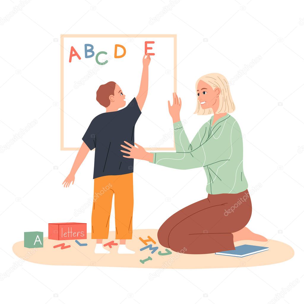 Child makes an English alphabet of letters on the board
